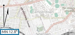 The same readout near Sydney reads 'MN 12.8°': the magnetic declination differs from place to place