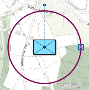 Selected range ring around the firing position on the map.army map with its purple radius handle marked