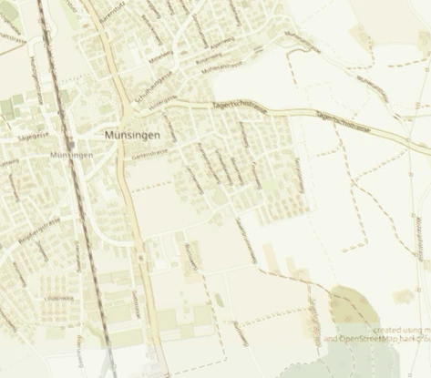 Sepia scan of Münsingen placed straight on the map.army base map at reduced opacity